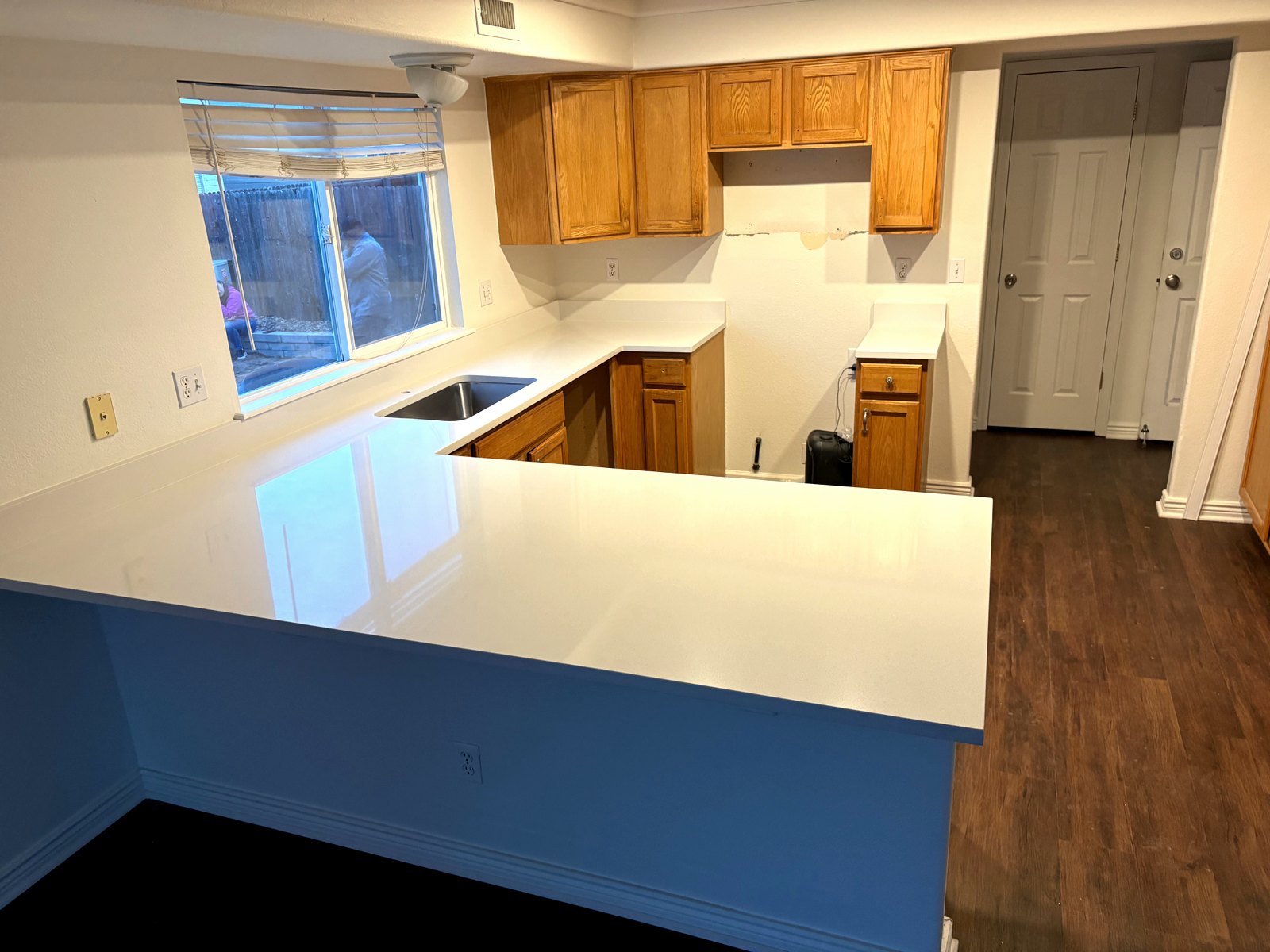 Bright White Quartz — High-gloss quartz counters fabricated and installed in one day